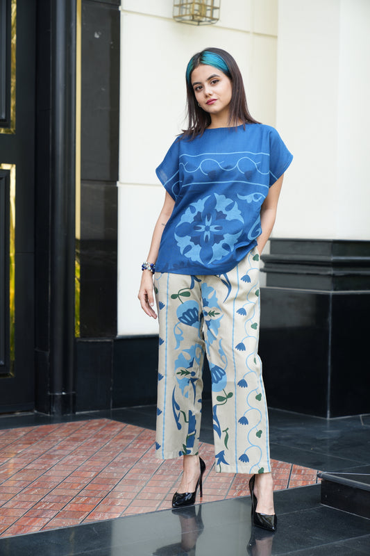 Blue highlighted top with beige printed pants