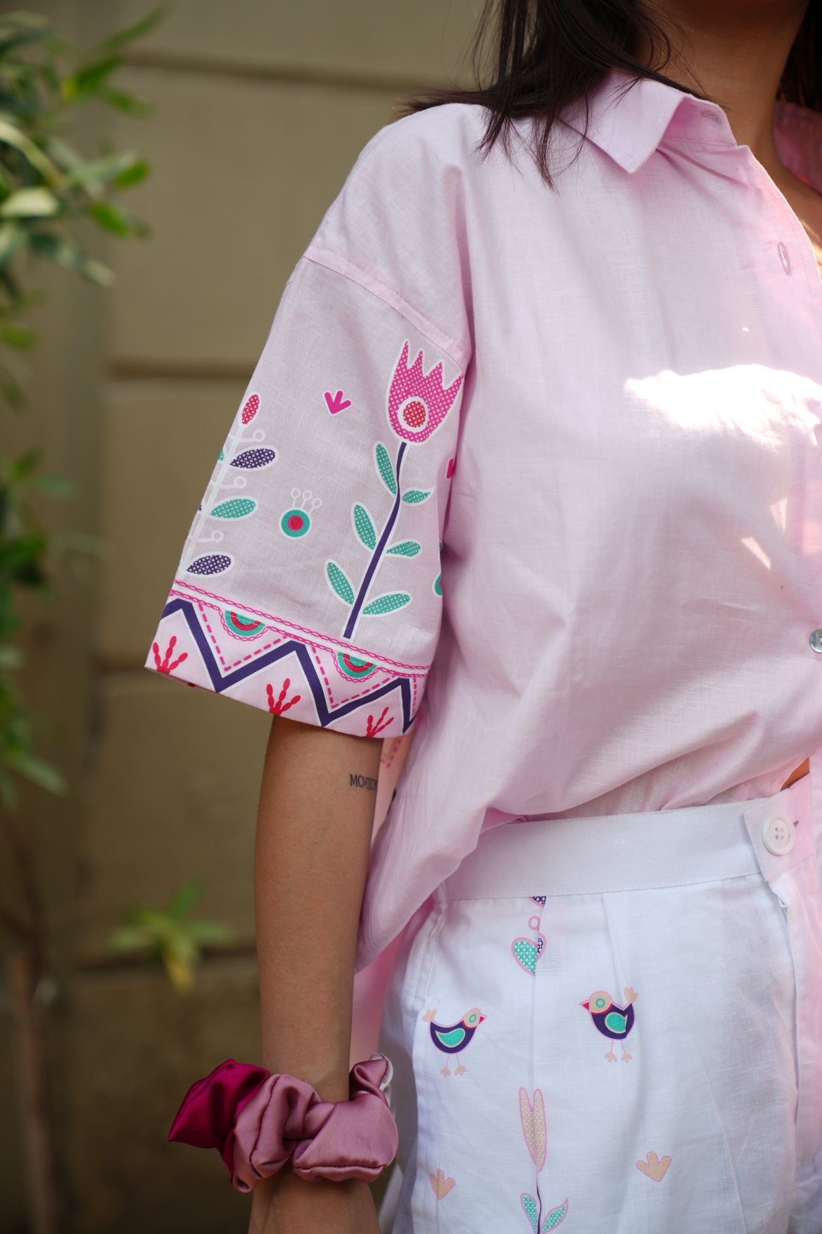 Pink hand printed shirt with white printed shorts