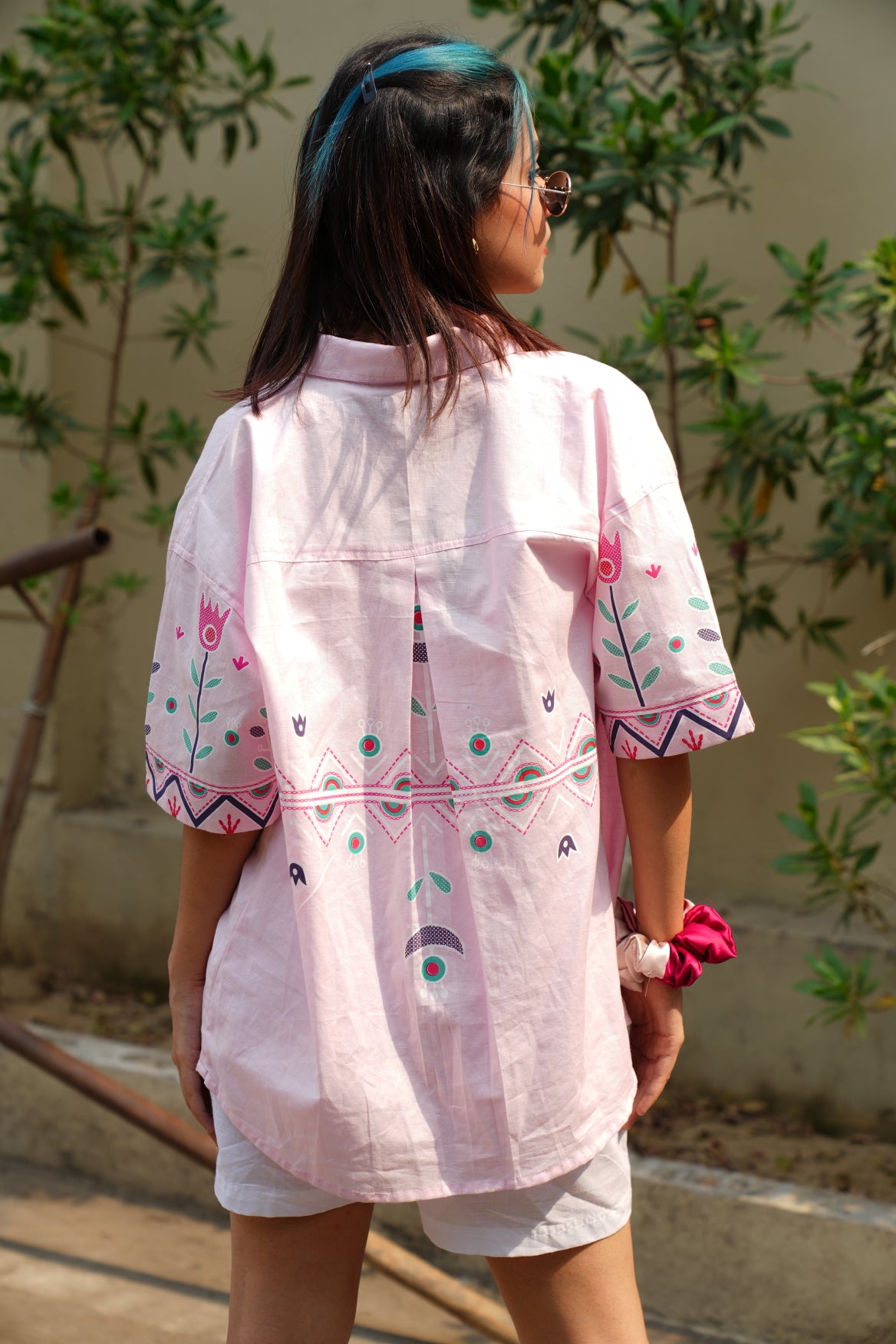 Pink hand printed shirt with white printed shorts