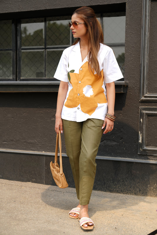 White blooming shirt with olive pants